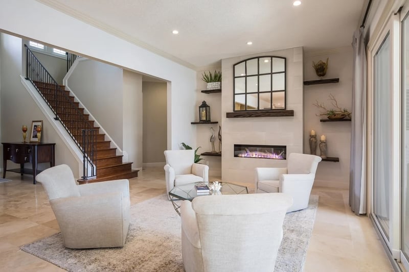 Modern living space with staircase and fireplace by Remodeler with AI Leads