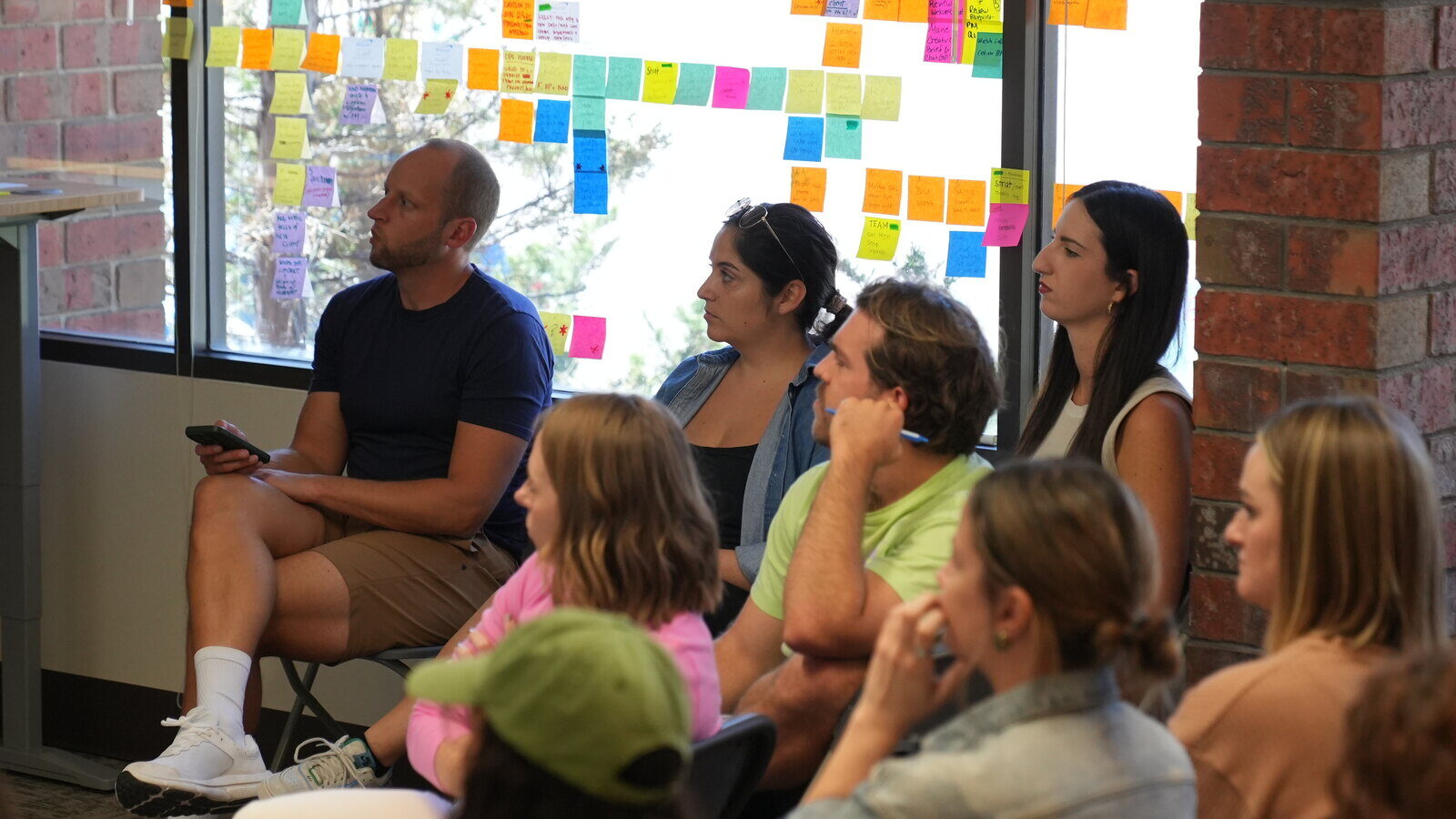 local-marketing-agency-team-listening-to-brand-strategy-presentation